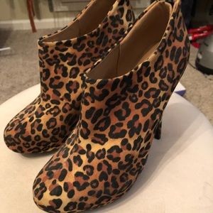 Leopard print boot heels. Size 6.